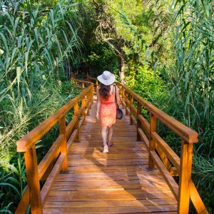 A beautiful scenery of a woman at the famous Krka National Park, Croatia